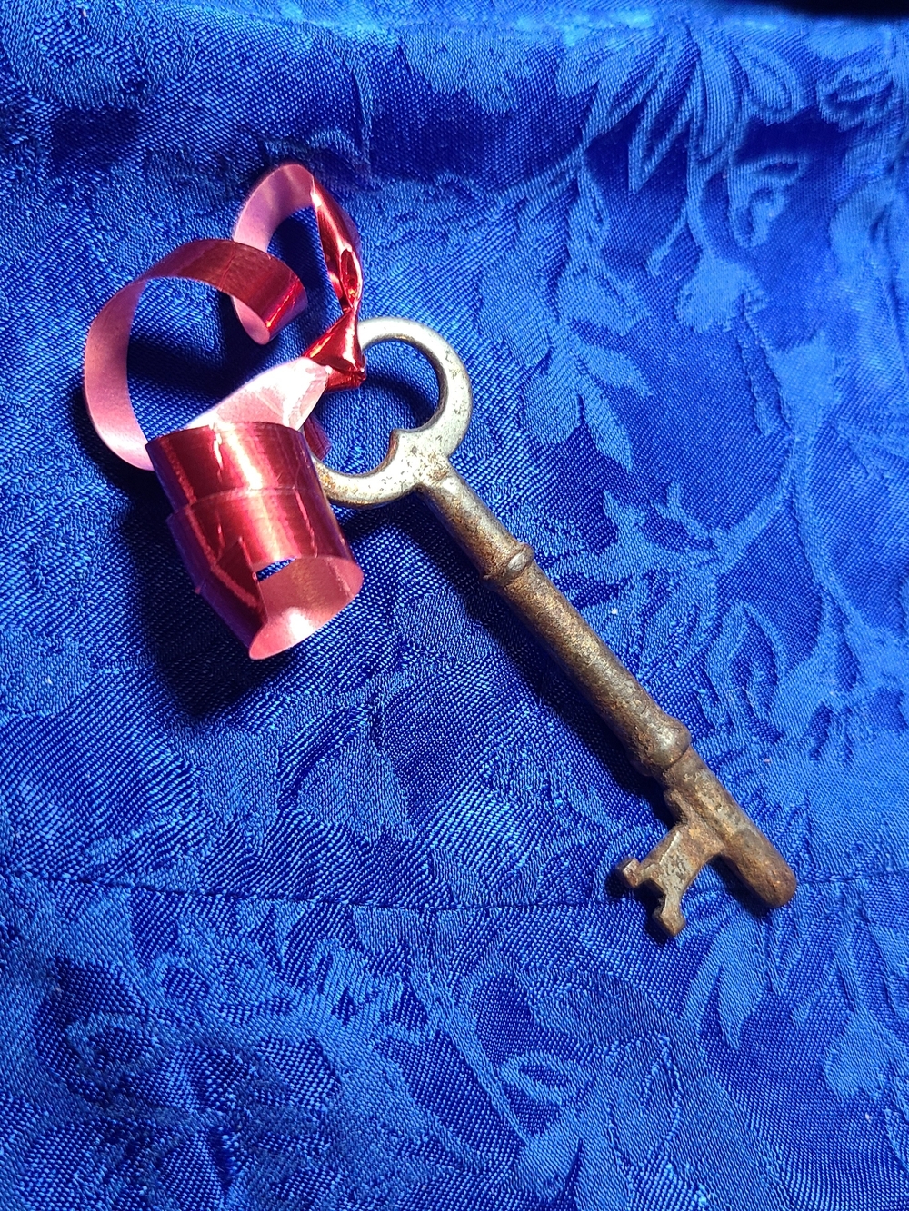 Antique Metallic Key with Red Curling Ribbon
